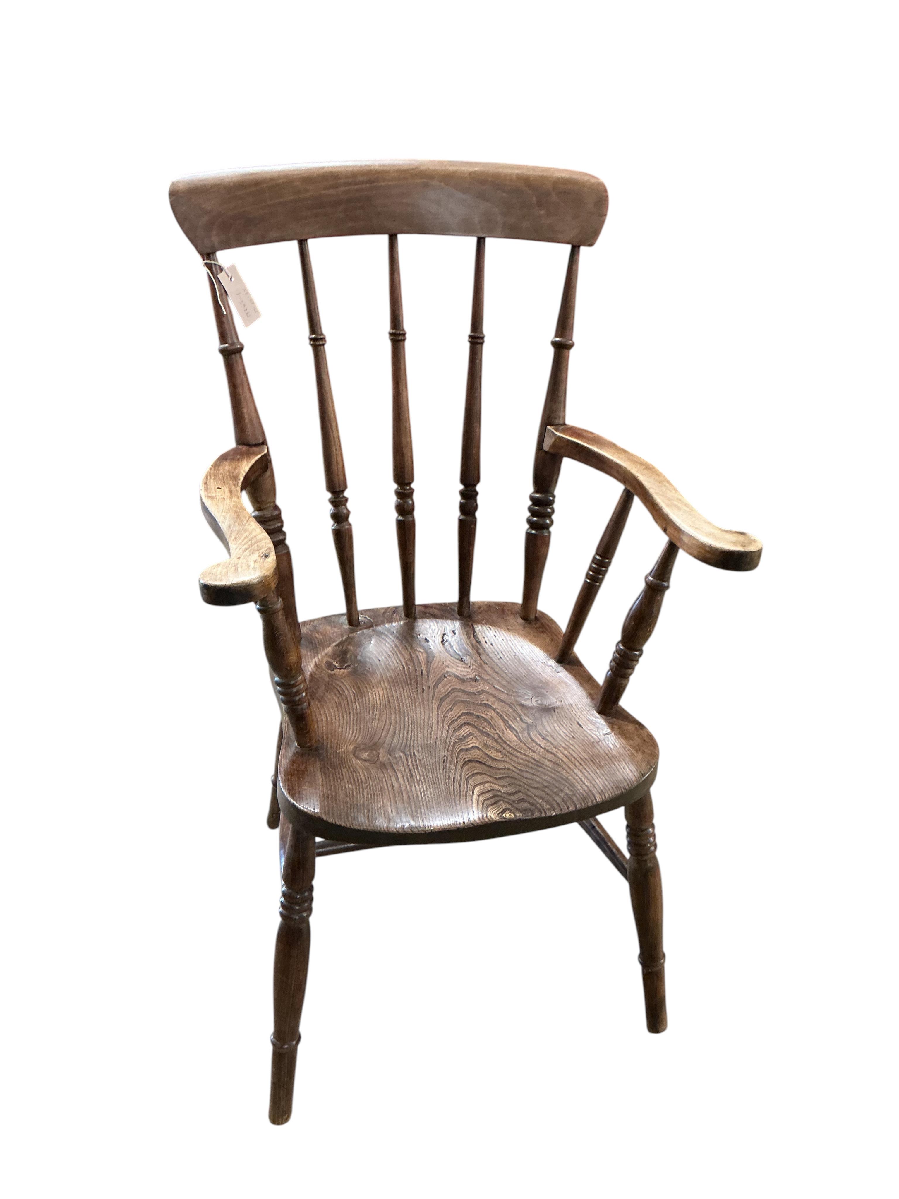 A Victorian elm and beech Windsor armchair, width 59cm, depth 46cm, height 100cm